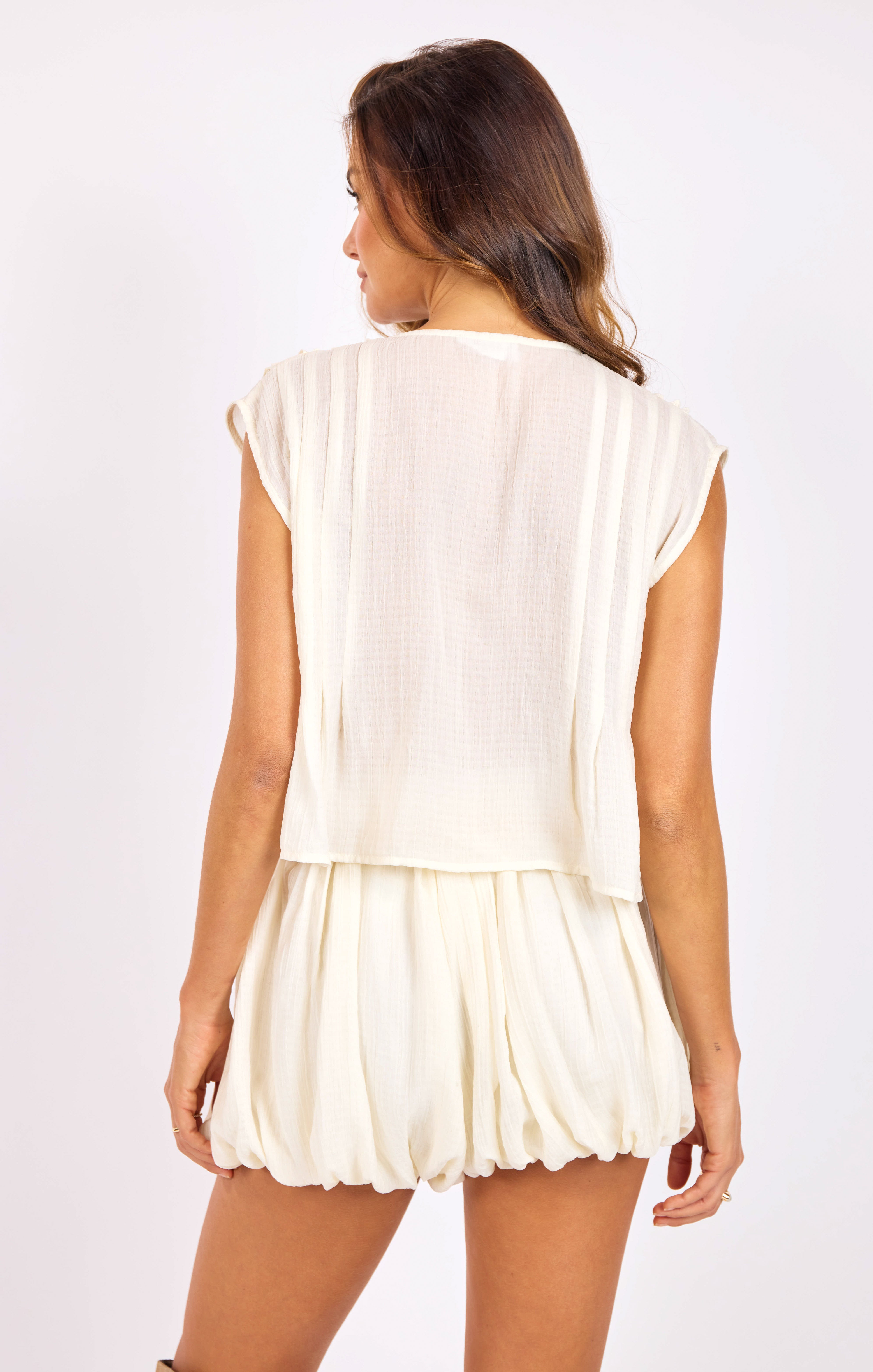 Daydreamer Ruffle Top in Cream - back crop view