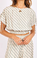 Light A Spark Top in Sage Cream - detail view