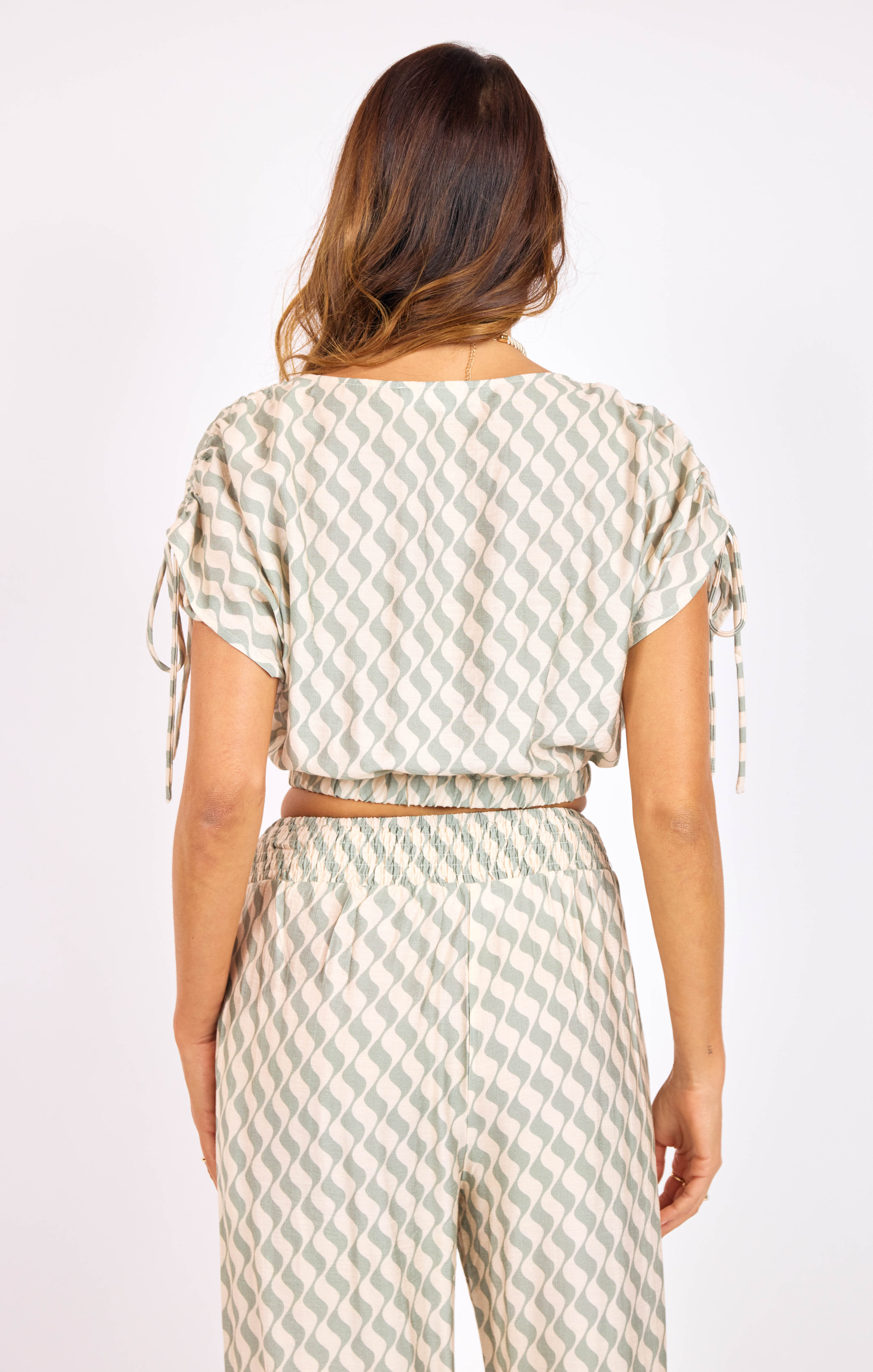 Light A Spark Top in Sage Cream - back crop view