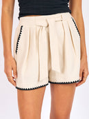 Compass Embroidered Shorts in Cream Black - detail view