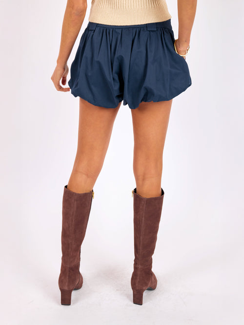 Maverick Bubble Shorts in Navy - back crop view