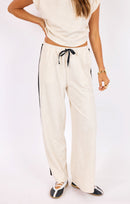Metro Knit Pants in Heather-Oatmeal-Black - front crop view