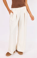 Hustle Pleated Pants in Ivory - front crop view
