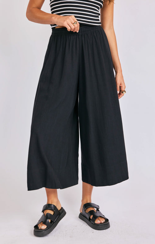 Neptune Pants in Black - front crop view